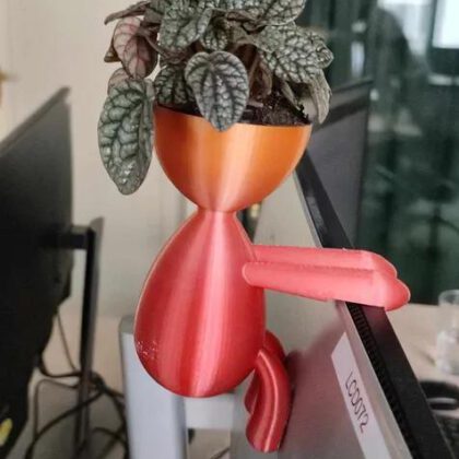 Climbing figure head planter