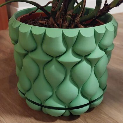Pot cover and drip tray with wavy design